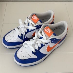 Nike Airforce 1 White and Blue Sneakers with Orange Logo